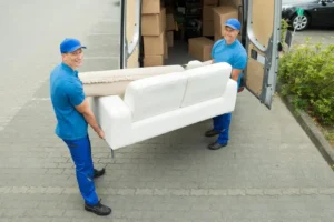 two-happy-male-workers-putting-furniture-boxes-truck_1221914-8969 (1)