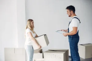 woman-moving-using-boxes_1157-35365